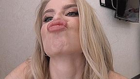 A blondie with a gorgeous make-up sniffs her lips! MP4