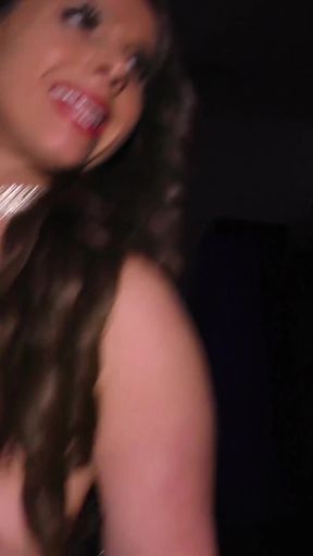 Busty flexible milf toying with a glow dildo