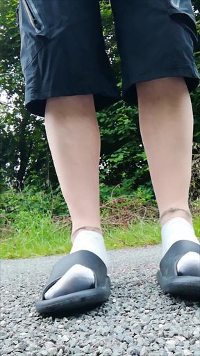 In Slippers and White Socks in Nature