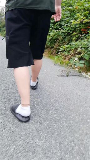In Slippers and White Socks in Nature