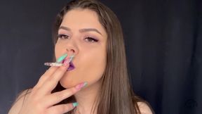 Smoking Cigarettes with Purple Lipstick Close-up