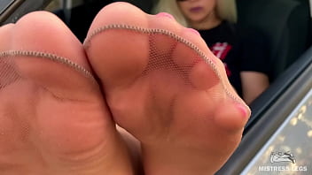 Hey footboy, instead of rubbing my windshield, you better clean my sweaty nylon feet