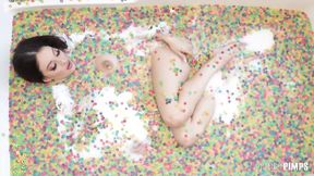 ”Big Breasted Brunette Maddy May Rubs Her Clit & Drills Herself with a Pink Dildo Solo”