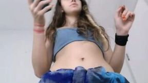 Hot young babe on webcam flashes her booty upskirt