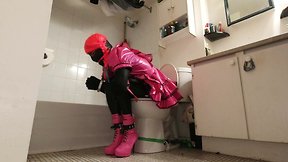 Bathroom bondage: crossdresser maids locked to toilet