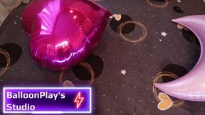 Popping helium foil balloons