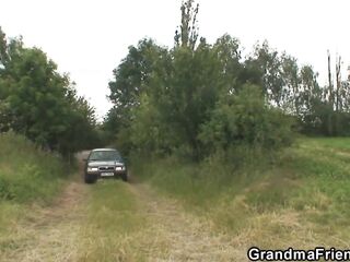 Picked up sexy grandma gets double penetration in the fields