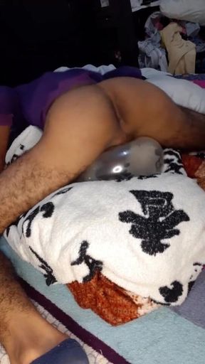Young Man Masturbates with Inflated Comdon