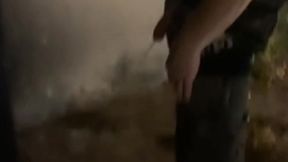 helping him pee in the street