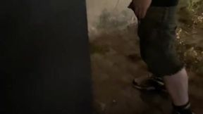 helping him pee in the street