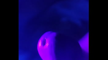 ifoslave playing with his cock in blacklight and cums