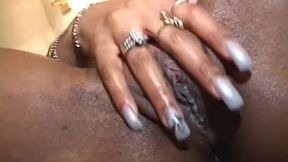 Brunette slut blows a hot black cock and fucks it on the sofa