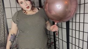 Big round balloon stuffing under dress, belly inflation