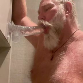 DaddybearAZ deep throats a dildo in the shower