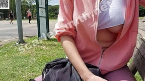 Busty exhibitionist bares all in public park