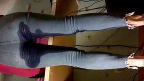 Emma pissing and working in tight jeans