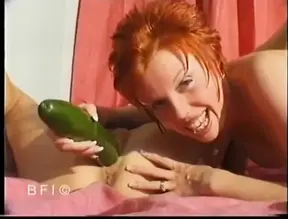 Redhead MILF plays with her friend&#039;s pussy