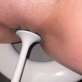 Licking public toilets in the hotel and playing with toilet brush