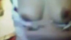 Cute and young Chinese chick on webcam flashes her perky boobs