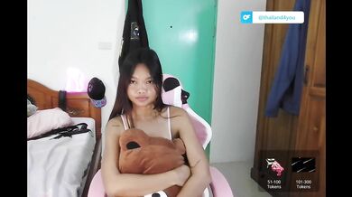 Cute Thai girl puts on a show