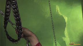 Blonde Mistress Dominates Chained Slave with Strap-On