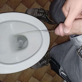 Pee in public toilet and cum on the graund