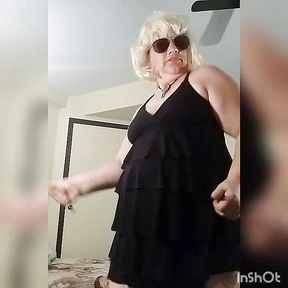 Skanky blonde stripteasing to polka music