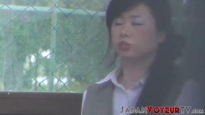 Dirty Asian slits flash thongs on public streets, winking at onlookers