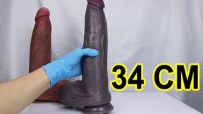 Colored giant realistic dildo stretches her holes