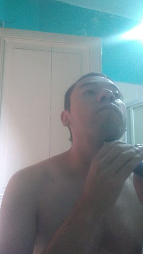 Man washes his face