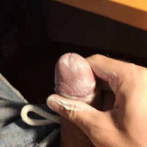 Touching cock with skin cream