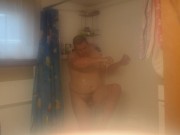 Getting cleaned up in the shower after getting very muddy and dirty