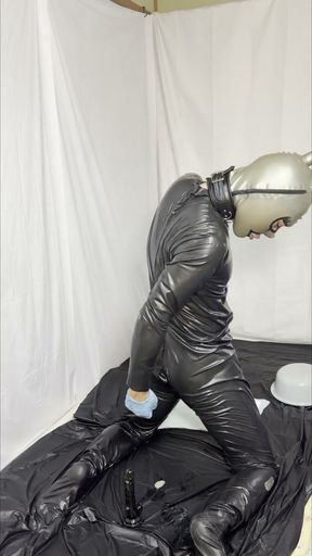 The perverted rubber doll inserts a into her anus.