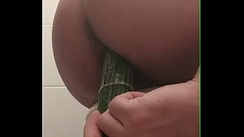 Fucking myself with a huge cucumber and loving it