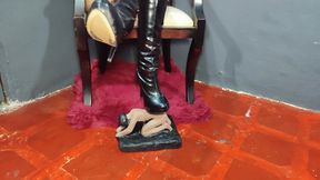 Giant woman with crossed legs and high boots dominating her tiny lover (4)