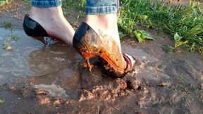 Wet and muddy high heels, high heels bending on the field, sandals in mud, wet sandals, high heels stuck in mud