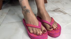 My favorite pink flip flops and tan pantyhose on me