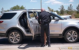 Gina Valentina gets pulled over by a police officer
