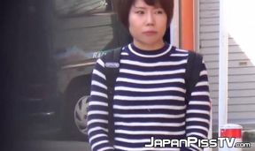 Asian babe's furry bush soaked in pee in public