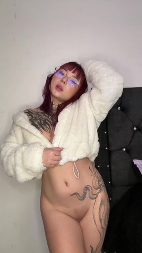 Sexy redhead in fur coat