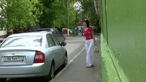 Tanya makes a puddle in a public place in piss fetish video