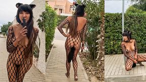 Racy Latin beauty flaunts her feline costume, plug and all