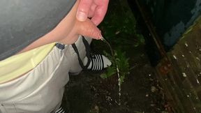 neo pissing outside in the rain