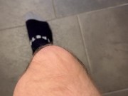 German soccer player showing off all black soccer socks