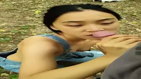 Busty blonde gives a wild outdoor fellatio