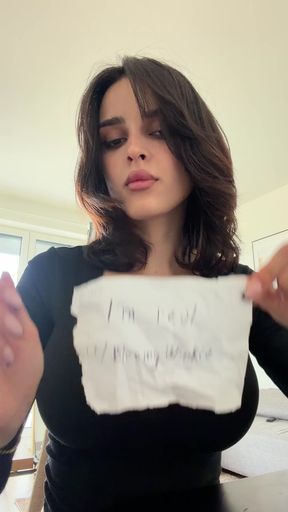 Woman holding a piece of paper