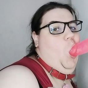 a transvestite trains sucked with a dildo