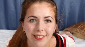 Barefoot Rachel, wearing black and white t-shirt and black skirt, hogtied with red rope, poses to the camera and occasionally is tickled by camera man (HD MOV)