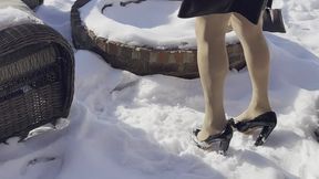 Playing with Heels in the Snow