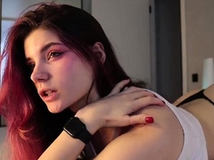 Busty redhead babe strips and masturbates